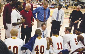 Getting to the Point: Coach Bill Sall addresses his team during a recent game. After two close losses of 66-68 and 66-69 against Saginaw Valley and Lake Superior State this weekend, the Bulldogs are tied with Saginaw Valley in the Great Lakes Intercollegiate Athletic Conference. Photo By: Kristyn Sonnenberg | Photo Editor