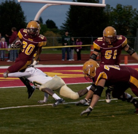 Winning Streak: Tyler Thomas, sophomore, attemps to leap over the Tiffin defense during Saturday’s game. The Ferris State football team took down the Tiffin Dragons on Saturday, Sept. 25. This brings the Bulldog record to 3-1 for the 2010 season. Photo By: Kate Dupon | Photo Editor Winning Streak: Tyler Thomas, sophomore, attemps to leap over the Tiffin defense during Saturday’s game. The Ferris State football team took down the Tiffin Dragons on Saturday, Sept. 25. This brings the Bulldog record to 3-1 for the 2010 season. Photo By: Kate Dupon | Photo Editor