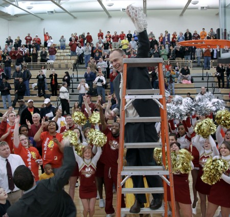 Cutting Down the Nets: Bulldog head coach Bill Sall holds the net after the team’s victory over Findlay on Feb. 19. in which the men’s basketball team claimed the GLIAC North title. Photo By: Brock Copus | Photographer Cutting Down the Nets: Bulldog head coach Bill Sall holds the net after the team’s victory over Findlay on Feb. 19. in which the men’s basketball team claimed the GLIAC North title. Photo By: Brock Copus | Photographer
