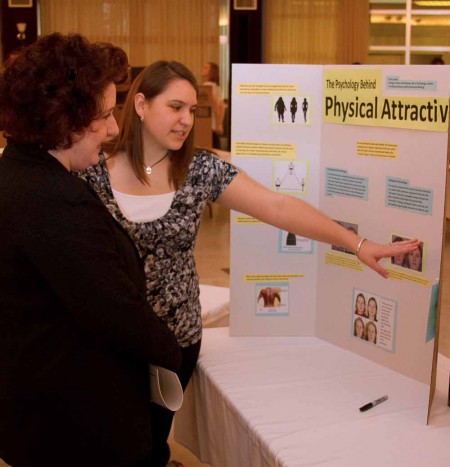 Honors Seniors: Jana Pisani listens to an honors senior describe what she has learned during her time at Ferris. Photo By: Brock Copus | Web Editor